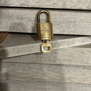 Louis Vuitton #309 Luxurious Gold Lock